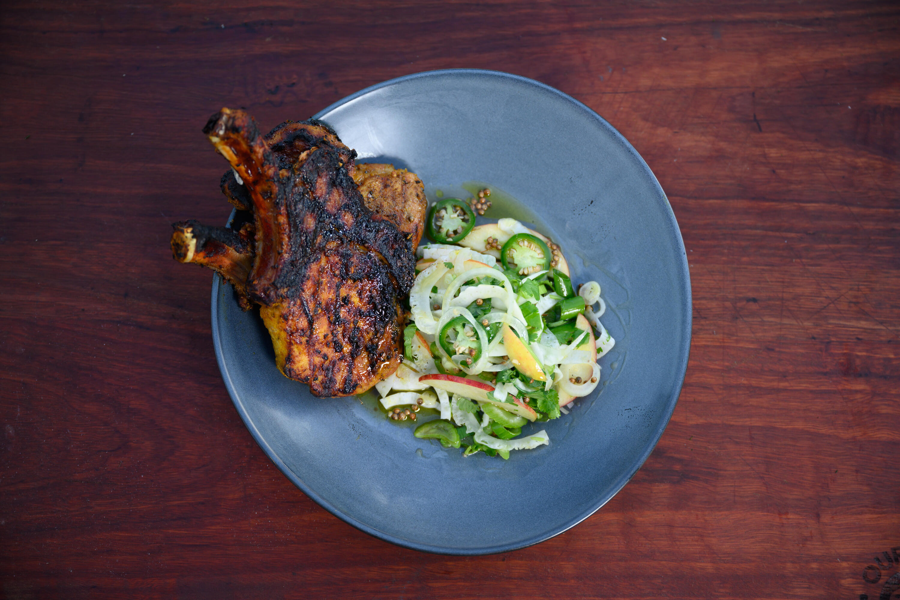Hayden Quinn’s Apple Juice Turmeric Pork Cutlet w/ Apple + Witlof Salad | Our Cow